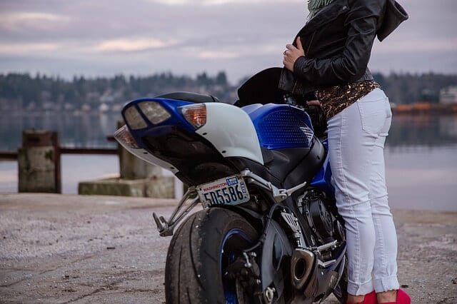 woman owning a sport bike